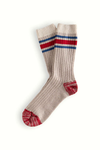 beige-sock-with-red-and-blue-stripes-on-a-white-background