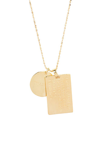 close-up-back-view-of-spell-s-virgo-stargazer-zodiac-necklace-charms-one-charm-is-of-a-rectangular-shape-and-an-inspirational-quote-while-the-other-charm-is-circular-the-brand-name